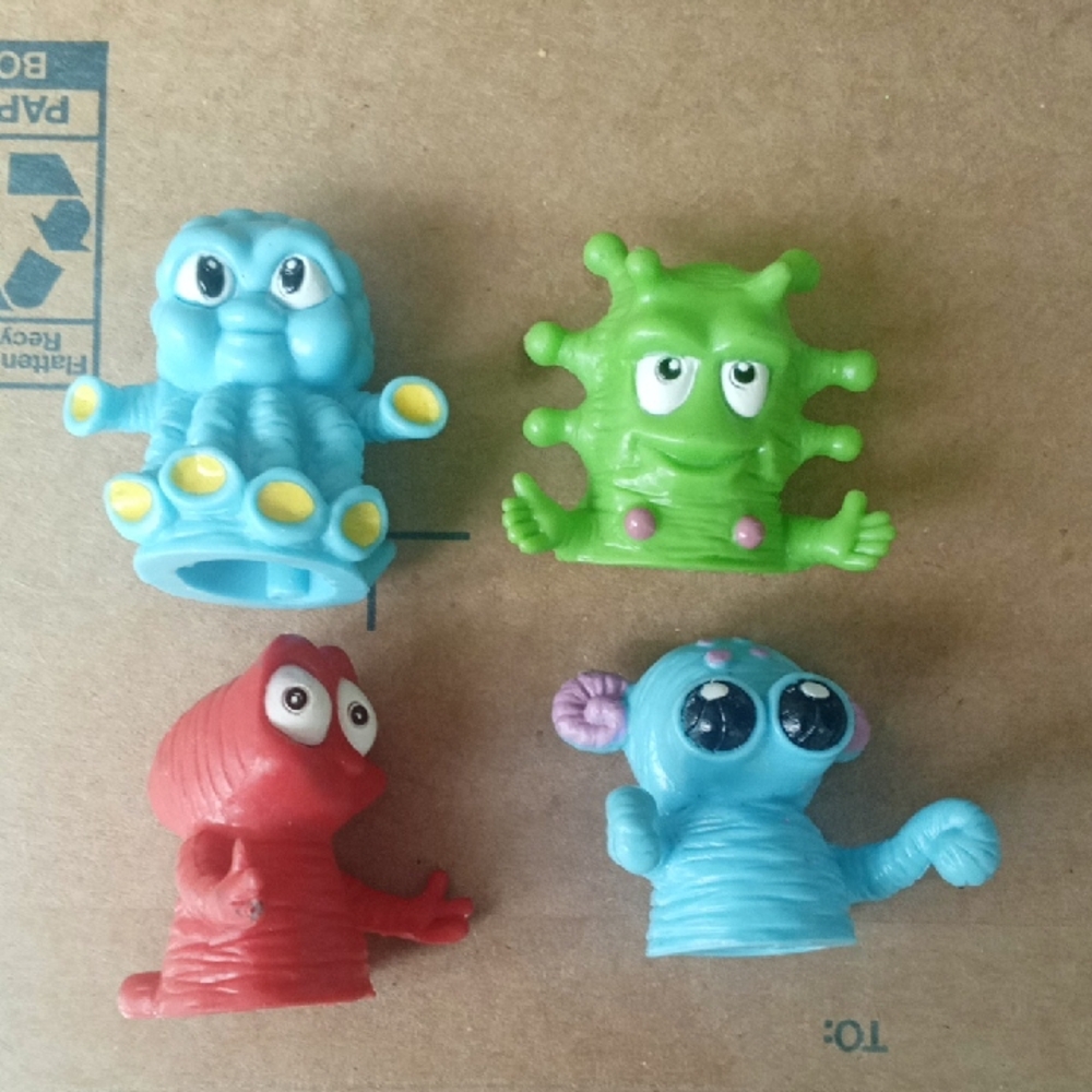 4 Rubber Monster Finger Puppets